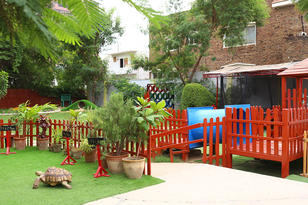 The leafy entrance of a VLC Karachi campus